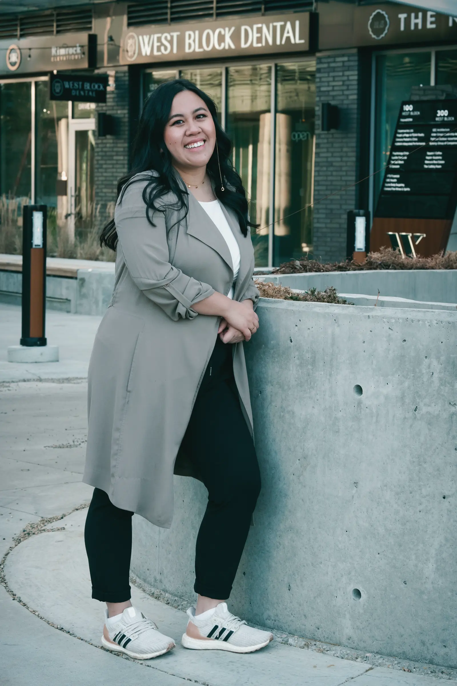 Dr. Katherina Nguyen, DDS, outside the West Block Dental entrance at 14101 West Block Drive NW
