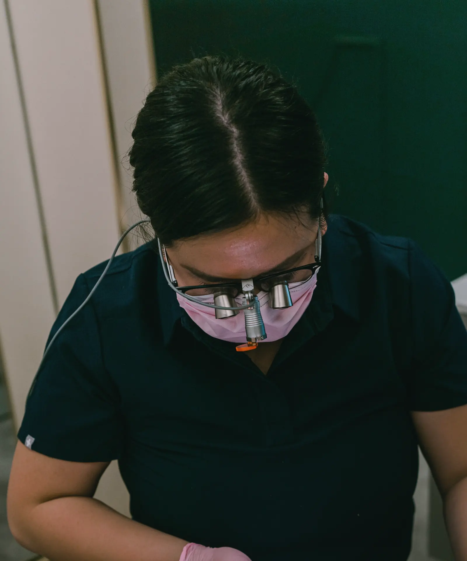 Dr. Kat examining a patient, seen from above