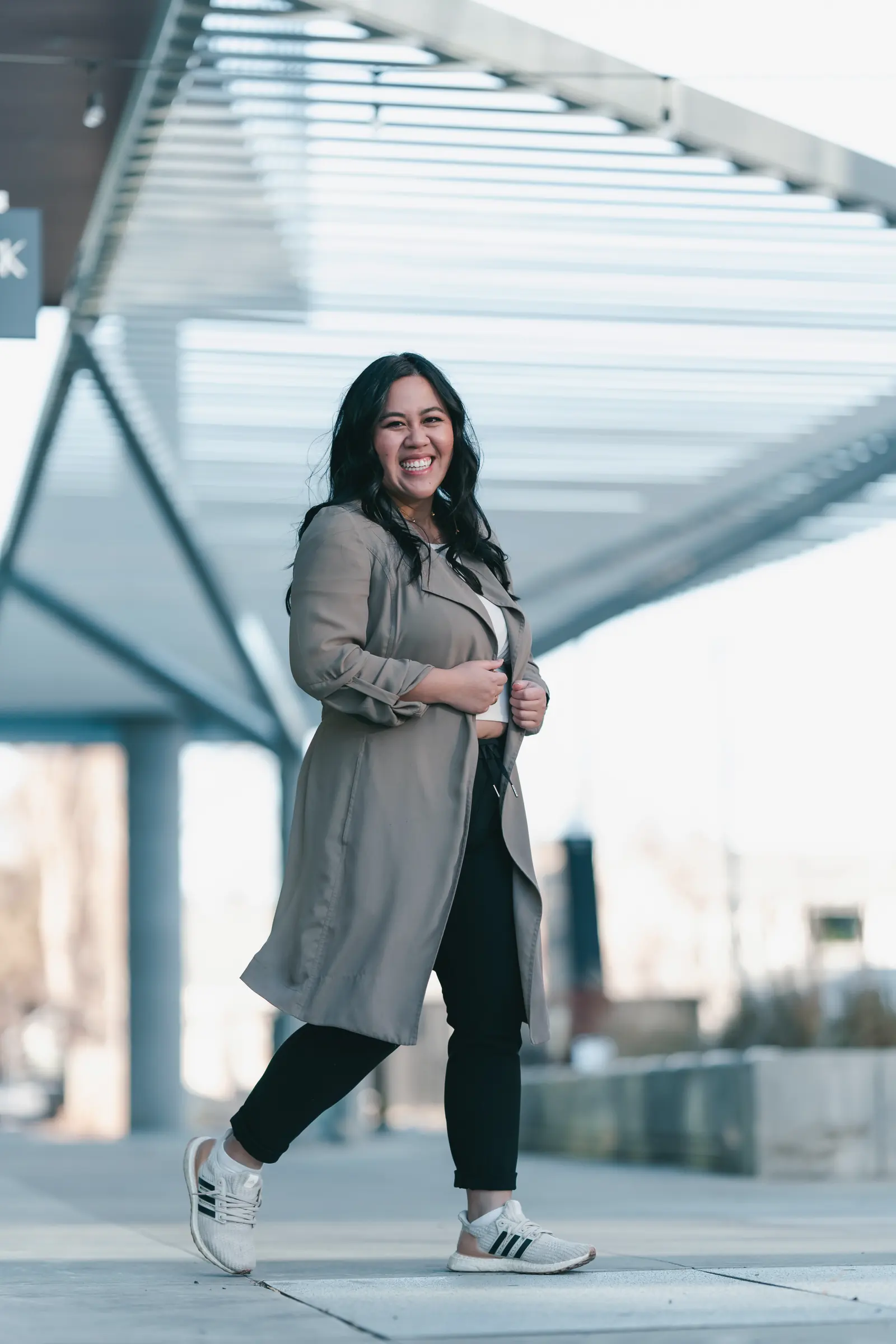 Dr. Katherina Nguyen, DDS, smiling under the canopy at West Block in Glenora